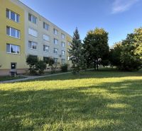 A housing estate with apartment buildings surrounded by greenery on Ďumbierska Street in Nitra.