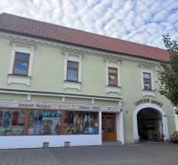 Commercial premises in Topoľčany with a textile assortment and entrance to the center of the passage.