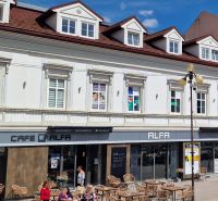 A building with a café and terrace on Sv. Egídia Square in Poprad, offices on the upper floor.