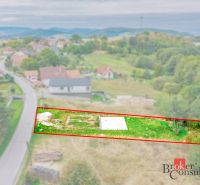 Plots - housing in Detva on gently sloping terrain with a view of nature.