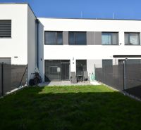 A two-story house with a terrace and garden on Topoľová Street in Rovinka.