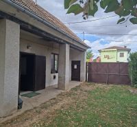 An older building with a garden on Main Street in Viničné, suitable for residential land.