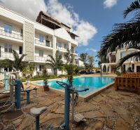 Swimming pool and fitness facilities in the premises of a 2-bedroom apartment in Zanzibar Mbweni.