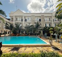 Residence in Mbweni, Zanzibar with a pool and tropical garden.