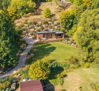 Recreational plots in Štiavnické Bane with a modern wooden structure and beautiful nature.