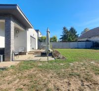 Family house in Horné Saliby with a terrace and a large garden on a sunny plot.