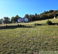 A small house on a gently sloping meadow in Záhrady near Krupina.