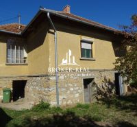 The family house in Bódvaszilas on Futrinka Street 111 has a stone plinth and a sloped roof.