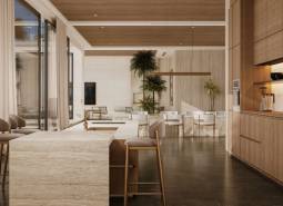 Interior photograph of a modern house with light furniture and large windows. House construction.
