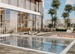 Construction of houses with glass surfaces and a swimming pool.