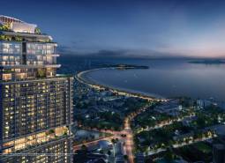 Night panorama of apartment construction in the city of Chon Buri 20150 with a view of the coastline.