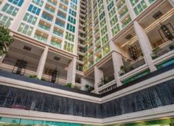 Apartment construction in Pattaya with vertical architecture and modern design at the forefront.