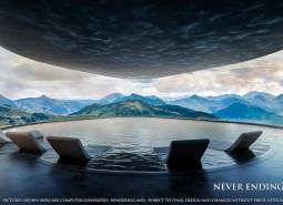 Apartment construction: View of the pool and mountain panorama with sun loungers.