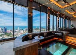 Interior with glass views of the panorama and sea within the construction of apartments.