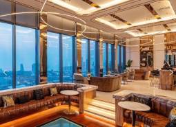 Luxury interior of apartment development with panoramic city views.
