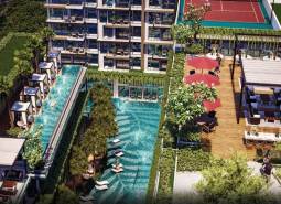 The construction of apartments in Pattaya includes a pool, terraces, and greenery for residents.
