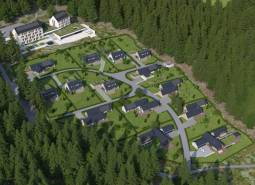 Development plots in Tajov with modern houses surrounded by nature and forest.