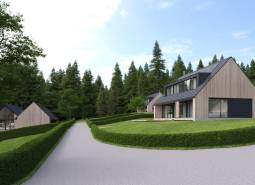 Development plots in Tajov with modern houses and surroundings full of greenery and forests.