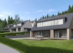 Visualization of modern houses on development plots in Tajov surrounded by forest.
