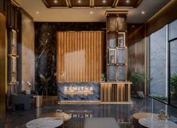 The interior of the entrance hall with a marble wall and a floor with a wooden design. Apartment construction.