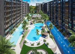 The construction of apartments in Pattaya with swimming pools, terraces, and palm trees creates a tropical atmosphere.