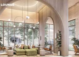 Modern lobby space with large arched windows and comfortable seating. Apartment construction.