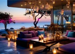 Luxury terrace with sea view and ambient lighting within the Apartment Construction.
