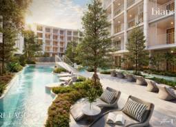 The construction of apartments in Phuket with a pool and greenery creates a relaxing environment.