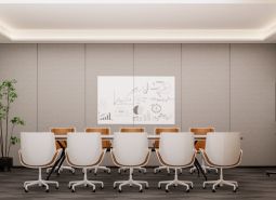Conference room with a whiteboard, modern chairs, and a screen, Apartment construction.