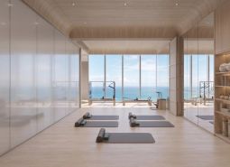 Interior of exercise spaces with a view of the sea, apartment construction.