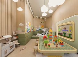 Children's playroom with toys and decorative walls as part of apartment construction.