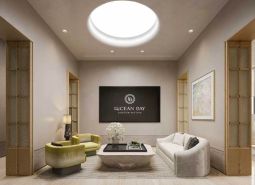 Elegant interior with wood-decor flooring, a sofa, and designer furniture.
