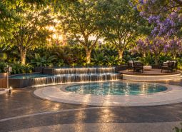 Luxury exterior with a pool and greenery, ideal for apartment development in the city of Pattaya.
