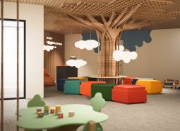 Colorful children's playground with a wooden tree and play blocks, apartment construction.