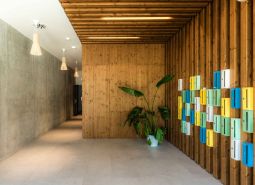 Interior with decorative elements and colorful mailboxes, Apartment construction.