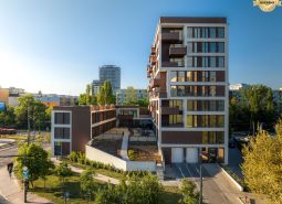 Construction of apartments on Mierová Street in Bratislava - Ružinov, with surrounding greenery.