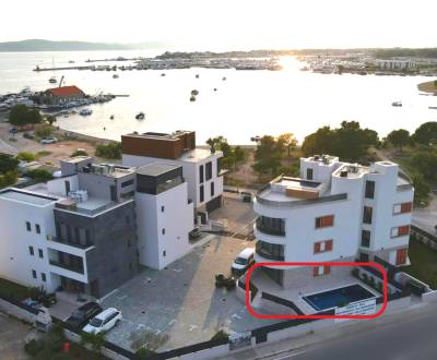 2-Bedroom apartment with terrace & pool, 1st row by the sea, Sukošan