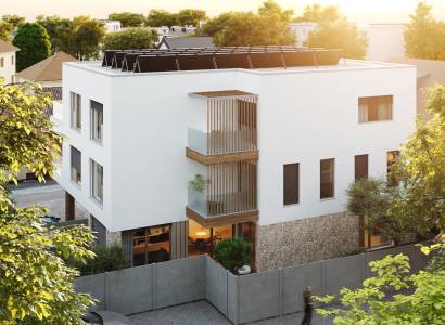 The construction of apartments on Kuzmányho in Trenčín with contemporary architecture and a green environment.