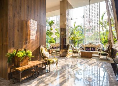 Luxurious interior with comfortable furniture and plants in apartment construction.