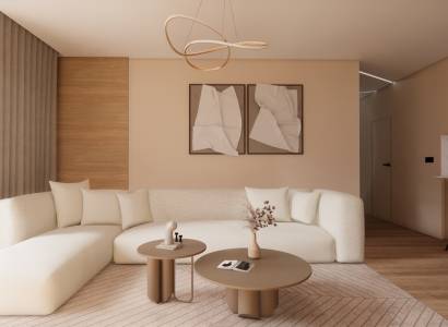 A bright living room with a sofa, tables, and a wooden decor floor in an apartment under construction.