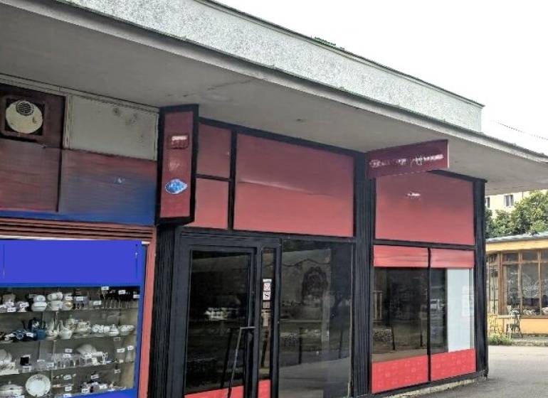 Commercial premises on Herlianska Street in Bratislava - Ružinov with display windows and an entrance.