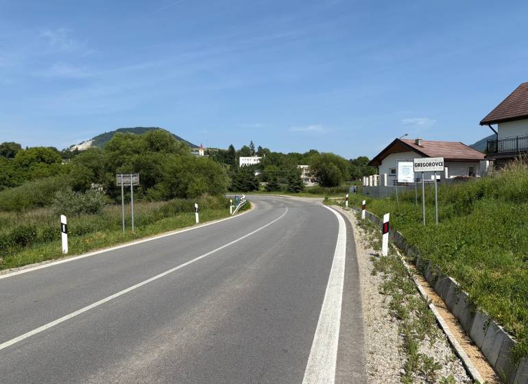 A road leading through the village of Gregorovce, suitable for residential plots, surrounded by nature.