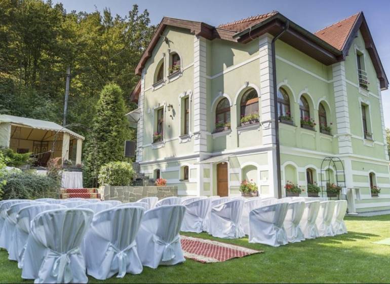 The exterior of the guesthouse Košice - North with a furnished garden, ready for events.