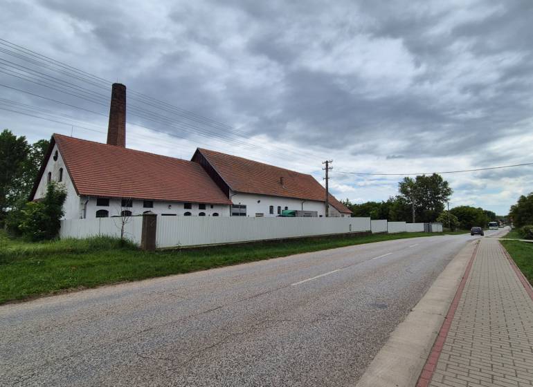 Road by the warehouse buildings in Zemianske Sady, Zemianske Sady Street.