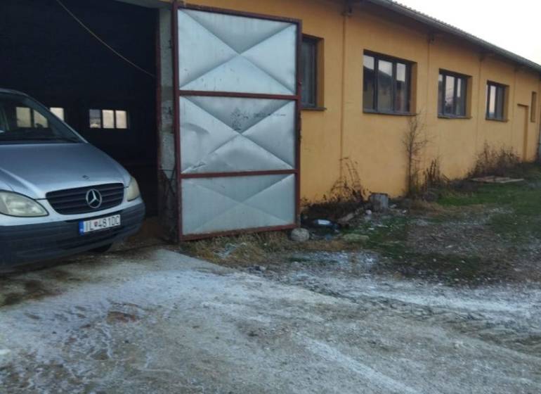 The image from Ladice shows warehouses and halls with a car at an open gate.