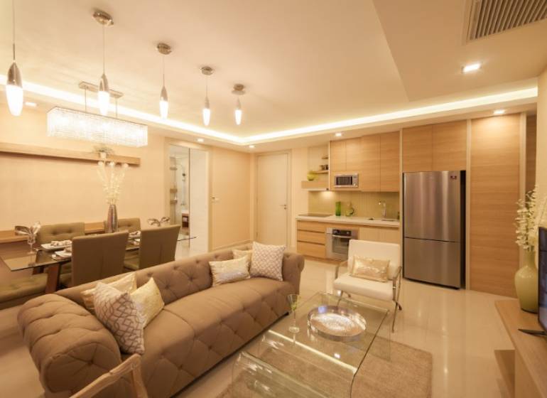 3-room apartment with a kitchen, dining room, and living room in soft shades.
