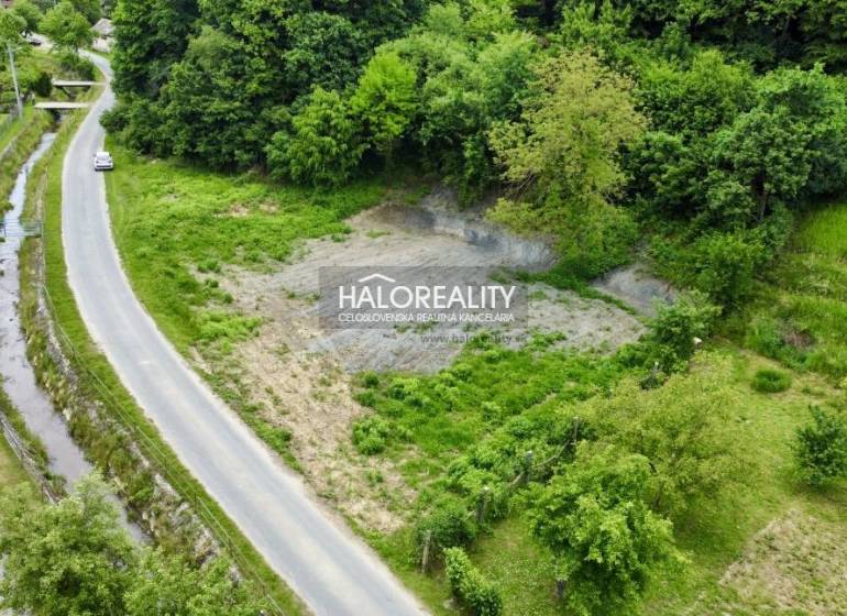 A residential plot in Selce with a road and greenery in a picturesque setting.