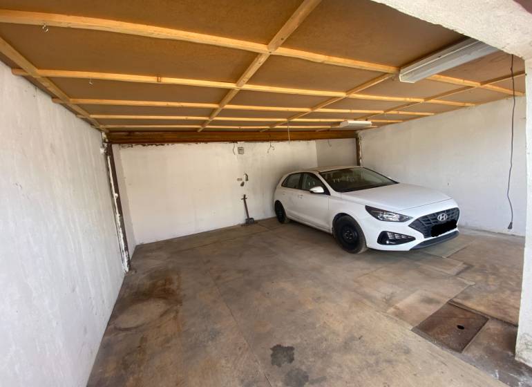 A car parked in the garage on Kolárska Street in Spišská Nová Ves.