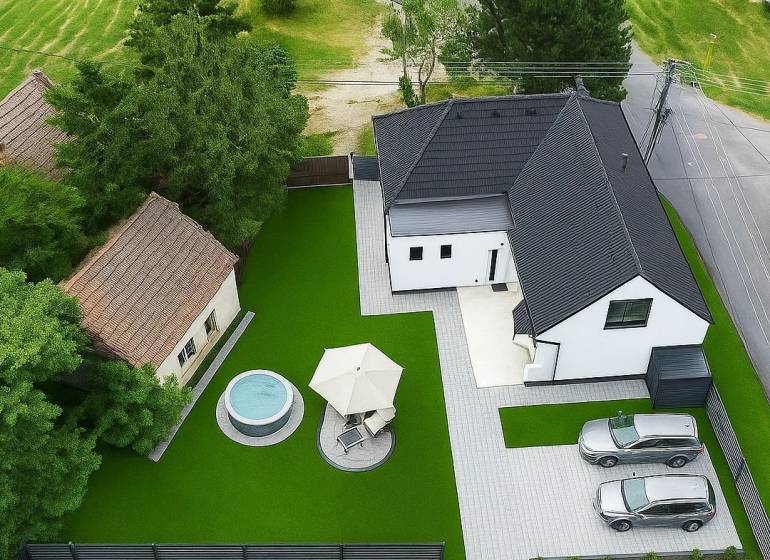 A top view of a family house on Stara Gala in Holice with a pool and terrace.