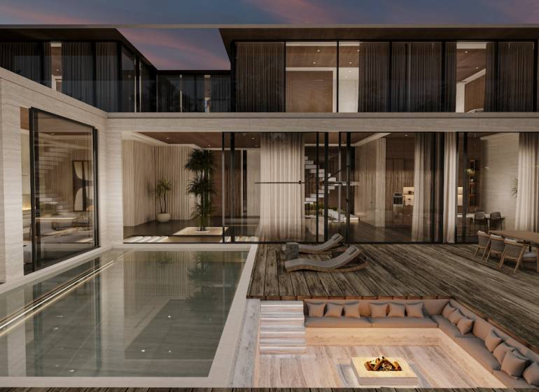 Interior of a family house with a pool, terrace, and a relaxing seating area by the fire.